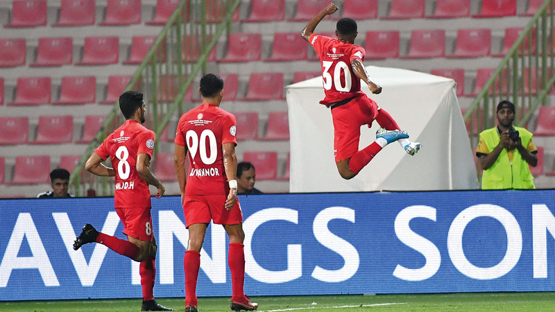 لاعب شباب الأهلي الموهوب محمد جمعة (بيليه) يحلق في الهواء، احتفالاً بهدفه في مرمى الفجيرة. تصوير: أسامة أبوغانم